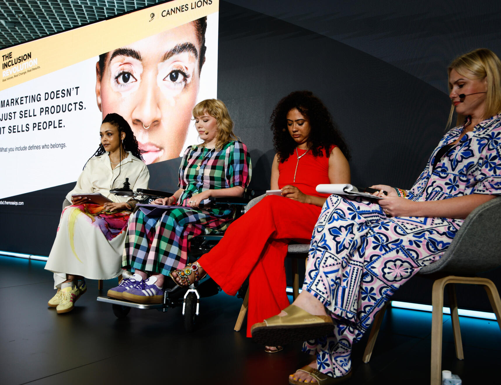 Charlotte, Emma, Natalie-Amber and Laura seated on the Forum stage, during their talk at Cannes Lions 2025